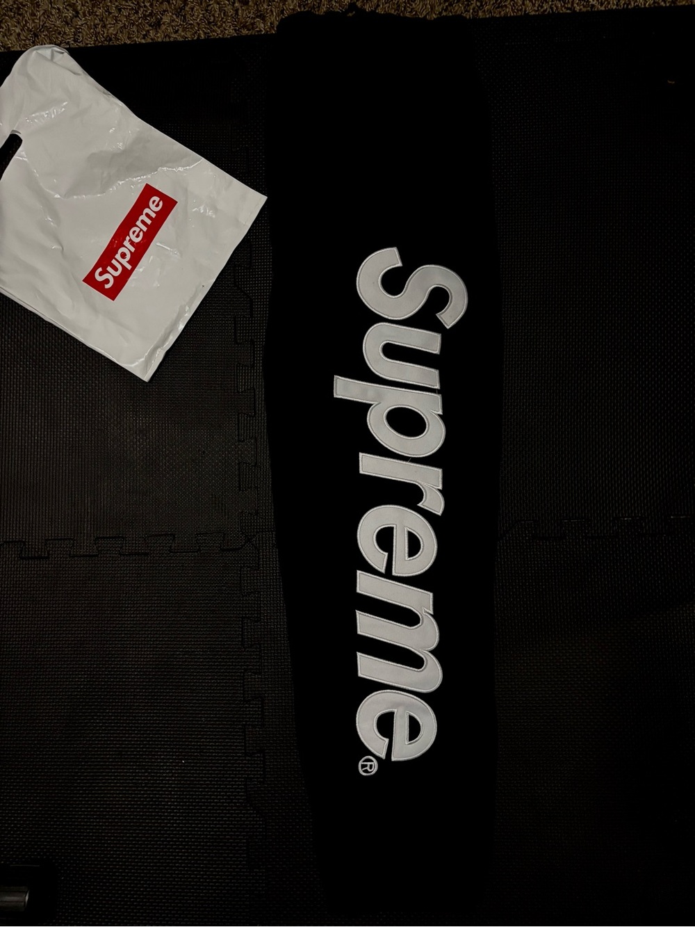 Supreme Black Sweatpants with White Vertical Logo